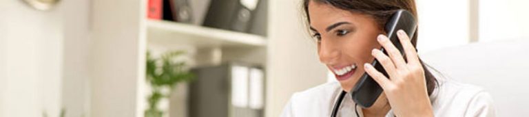 Triage nurse asking the right questions with a patient to produce a productive disposition