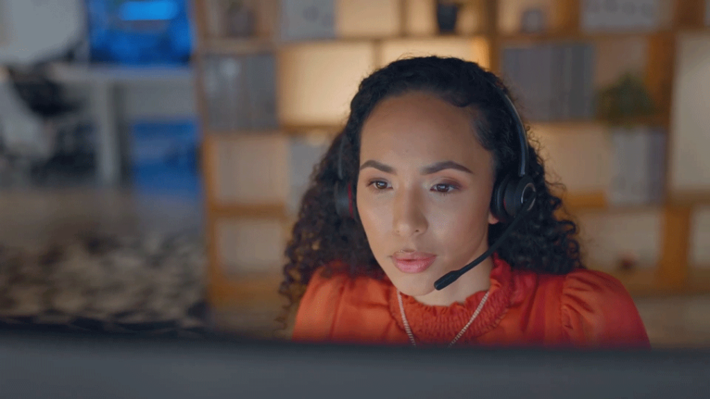 An outsourced triage nurse at her workstation.