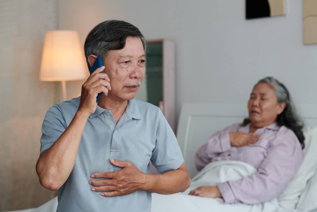 A worried elderly man calls a triage line to talk about his ailing wife's symptoms.