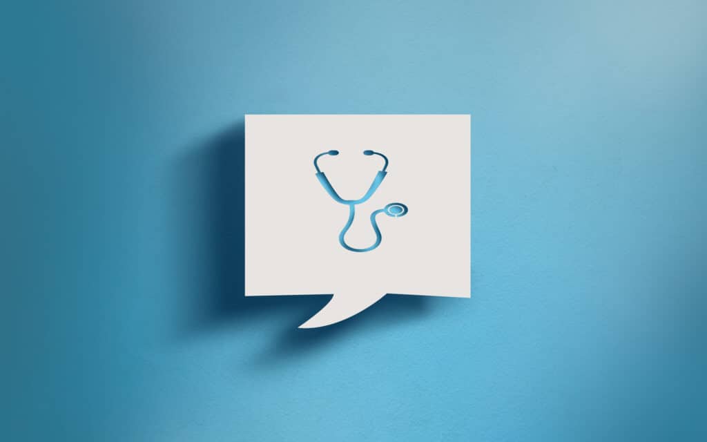 A stethoscope symbol cut out of a square message bubble against a blue background represents medical answering services.